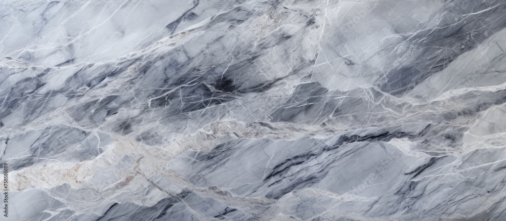 A detailed shot showcasing the intricate patterns of a gray marble texture, resembling the waves of a frozen liquid captured in rock A detailed shot showcasing the intricate patterns of a gray marble texture, resembling the waves of a frozen liquid captured in rock