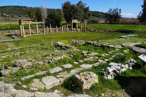 Brauron or Vravrona, Attica, Greece. The ancient sanctuary of Artemis, columns of the arcade or stoa and ruins of the temple photo