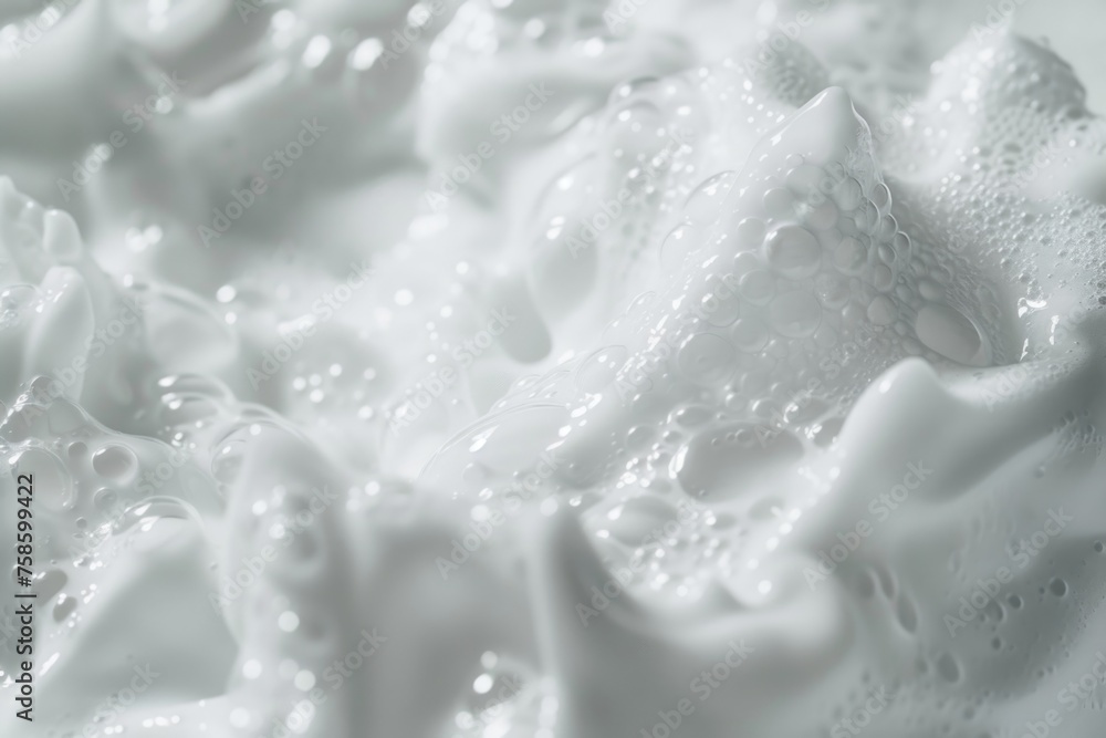 Image is of white foam with bubbles and water droplets - obrazy, fototapety, plakaty 
