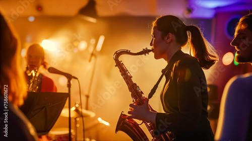 Woman playing saxophone on stage