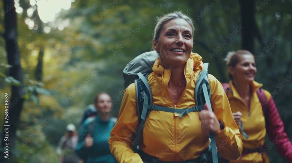An elder adventurer trails behind a group in a lush forest, showcasing the timeless joy of hiking and exploration, rucking, do workout, running, ruck marching, endurance training An elder adventurer trails behind a group in a lush forest, showcasing the timeless joy of hiking and exploration, rucking, do workout, running, ruck marching, endurance training