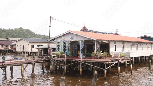 stilted houses on the river in the floating villages of Kampong Ayer in Bandar Seri Bagawan in Brunei Darussalam
 photo