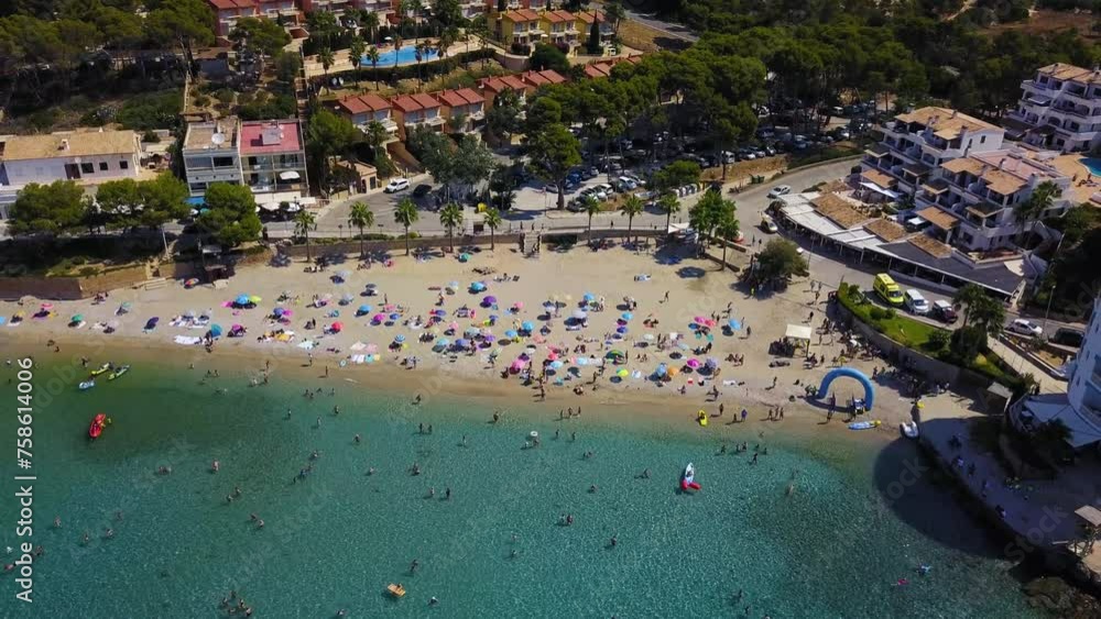 Drone panning from the right to the left side of the frame above the popular beach resort of Playa de San Telmo, in Puerto de la Cruz, Canary Islands, Spain. Drone panning from the right to the left side of the frame above the popular beach resort of Playa de San Telmo, in Puerto de la Cruz, Canary Islands, Spain.