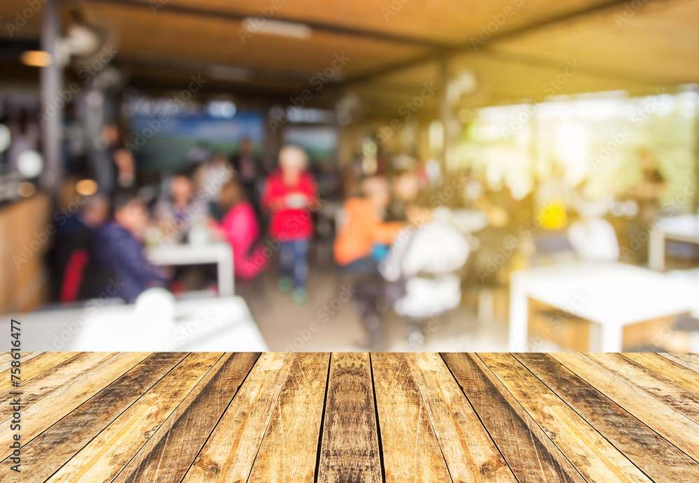 Selected focus perspective wood table with blur background