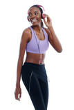 Exercise, music and thinking with happy black woman in studio isolated on white background for radio streaming. Fitness, idea and headphones with young sports model listening to audio at training