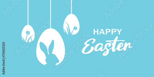 Blue easter celebration design, white hanging egg decorations, with bunny silhouette, and floral and grass designs on eggs, on a blue background. Seasonal Easter greeting.