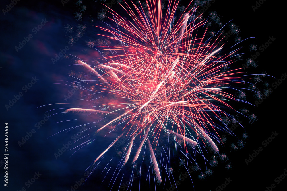 Volleys of beautiful fireworks in the night sky Volleys of beautiful fireworks in the night sky