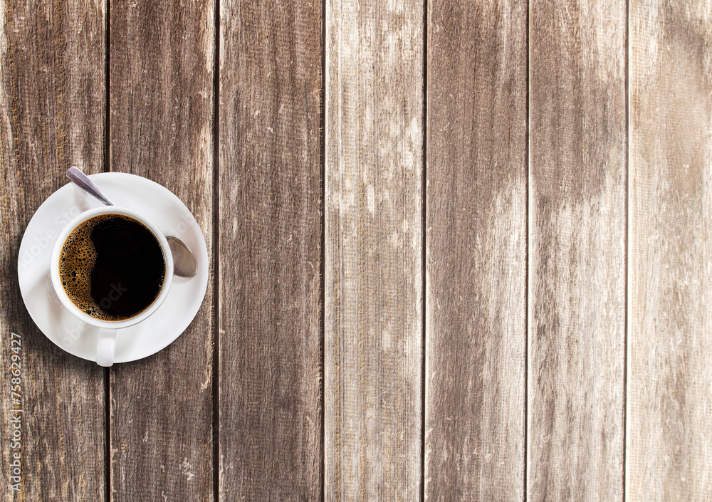 Cup of coffee on wooden table background Cup of coffee on wooden table background