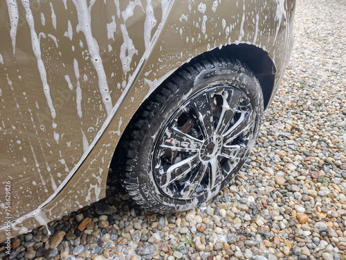 Car during washing. Washing the car