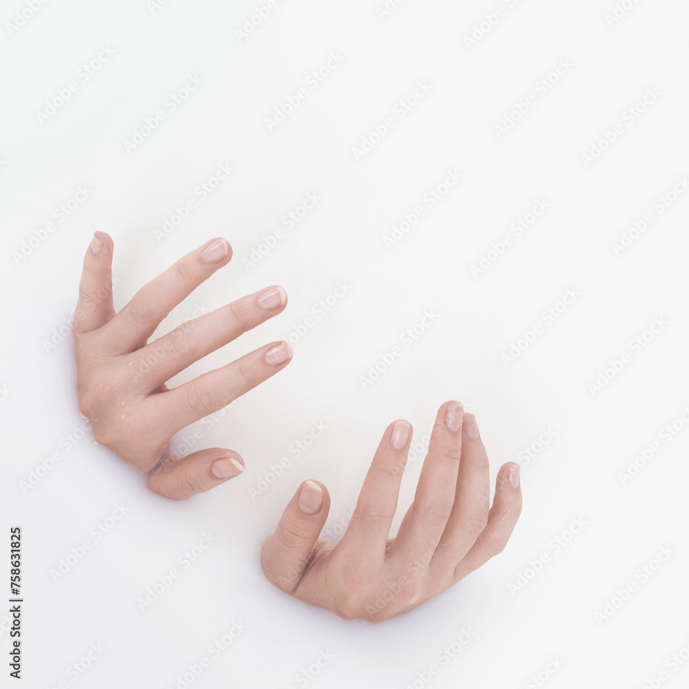 Hands, manicure and woman in milk bath for beauty, spa and hydration treatment at home. Self care, nails and closeup of female in dairy liquid water for hygiene, clean and soft skin routine.