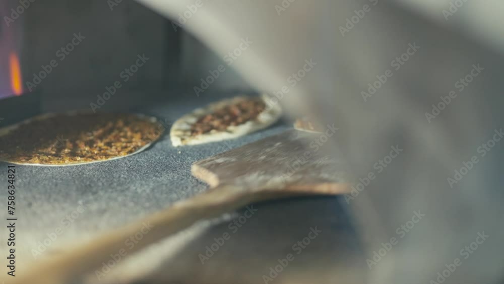 Almonds roasting on an open flame in a kebab shop, conveying warmth and tradition Almonds roasting on an open flame in a kebab shop, conveying warmth and tradition