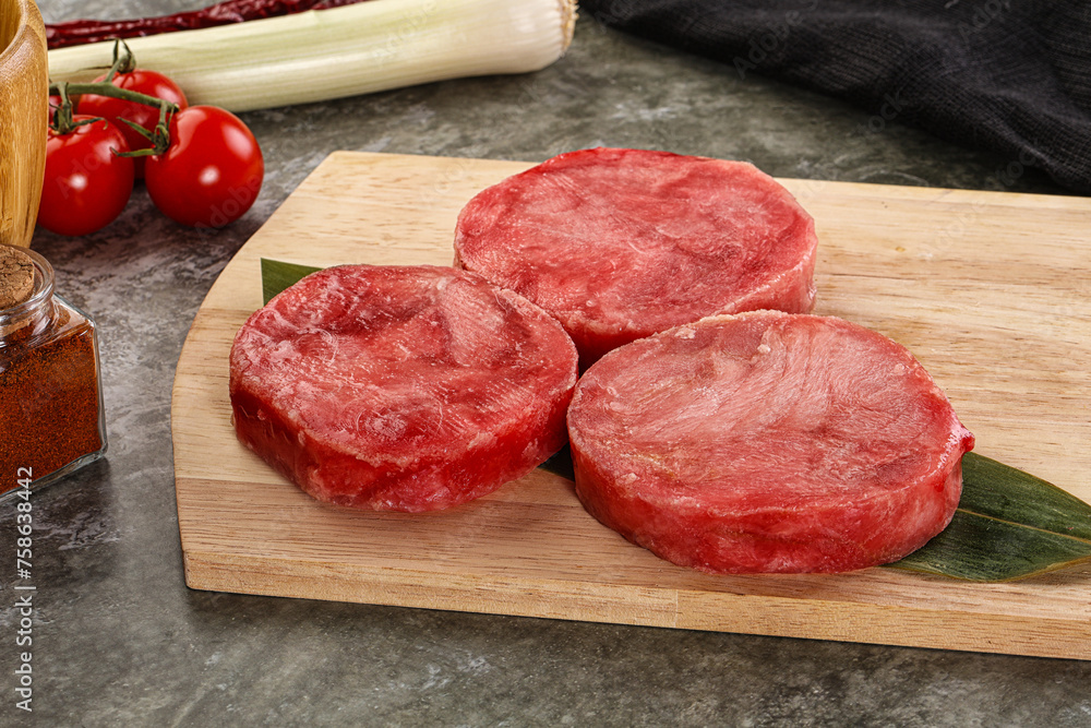 Delicous raw tuna medallion for cooking Delicous raw tuna medallion for cooking