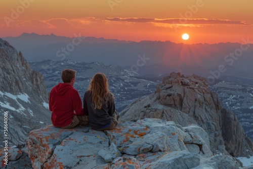 Travelers witness a sunset from a mountainous vantage point. © Good AI