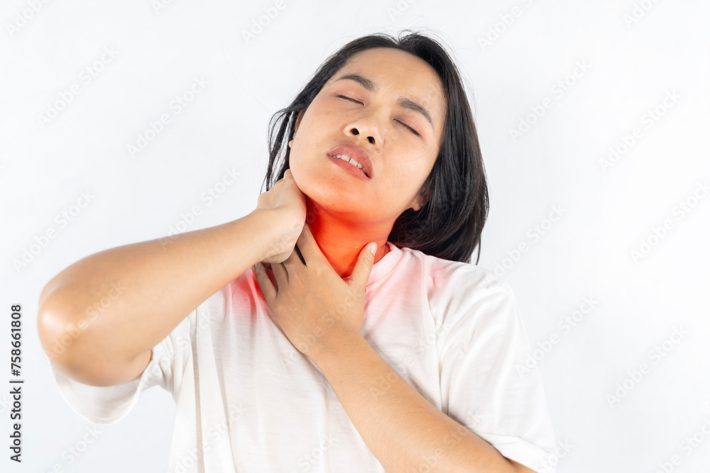Unhealthy dark haired woman touching neck feeling pain and numbness, worried about muscle tension, osteochondrosis. Unhealthy dark haired woman touching neck feeling pain and numbness, worried about muscle tension, osteochondrosis.