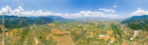 Lamia, Phthiotis, Greece. Panorama of the valley with fields. Olive trees, colorful fields. Summer, Cloudy weather. Panorama 360. Aerial view photo