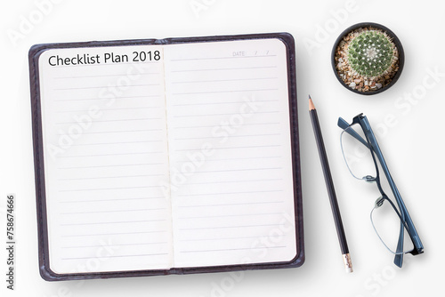 Conceptual business of notebook,laptop computer with new year goals word photo