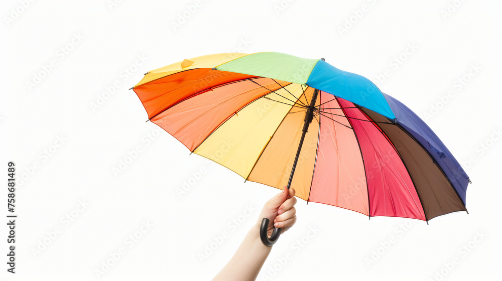Hand holding multicolored umbrella isolated on white .