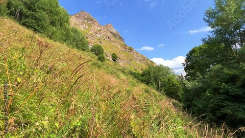 View of the mountain range near Mount Zakan. The top of the mountain node of the western part of the main ridge of the Greater Caucasus. Zakan Peak is the beginning of the Magisho mountain range. 4К photo