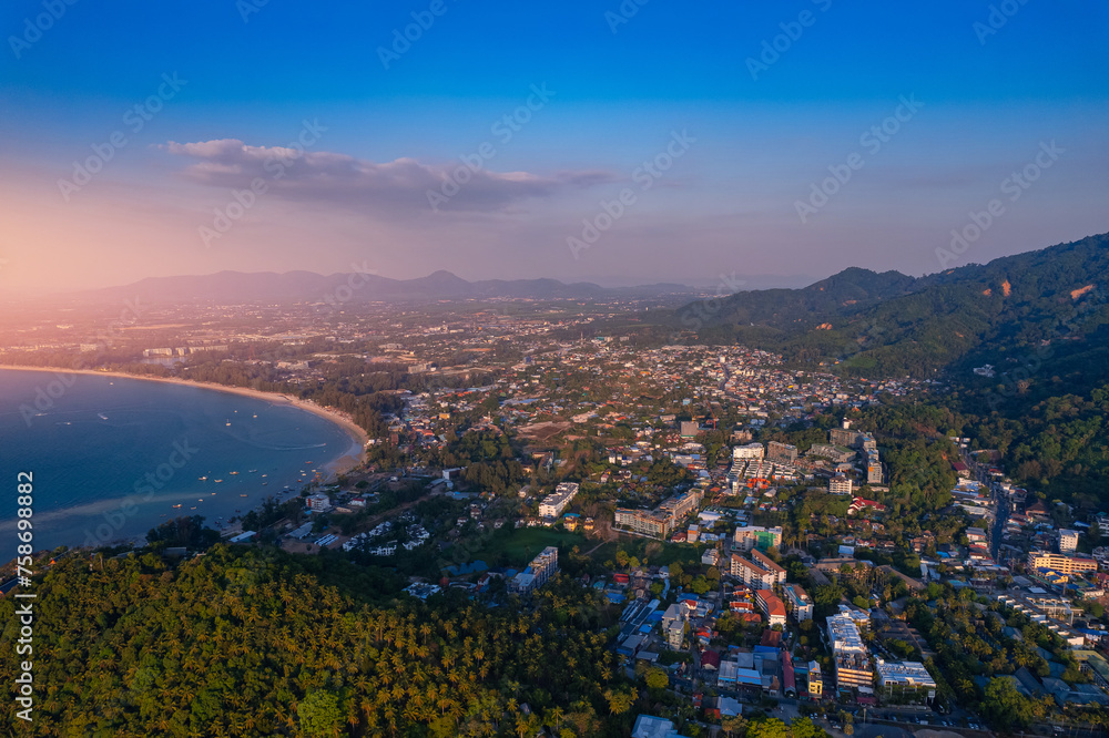 Aerial top view panorama sunset Surin beach with sea of Phuket paradise. Concept tropical travel photo Thailand