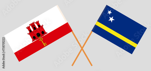 Crossed flags of Gibraltar and Country of Curacao. Official colors. Correct proportion