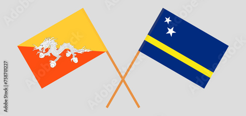 Crossed flags of Bhutan and Country of Curacao. Official colors. Correct proportion