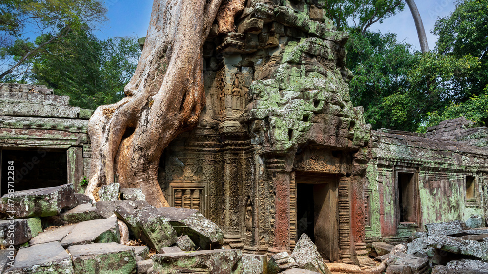 Ancient ruins of the Ta Prohm temple complex in Cambodia. Ancient ruins of the Ta Prohm temple complex in Cambodia.
