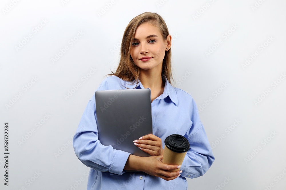 Young successful business lady holding laptop, portrait for business Young successful business lady holding laptop, portrait for business