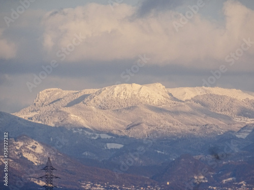 The snow-covered Gutai Mountains, near the city of Baia Mare, Romania