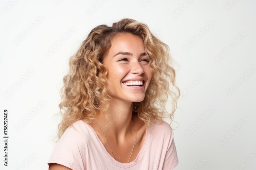 Portrait of a happy young woman with curly hair on white background Portrait of a happy young woman with curly hair on white background
