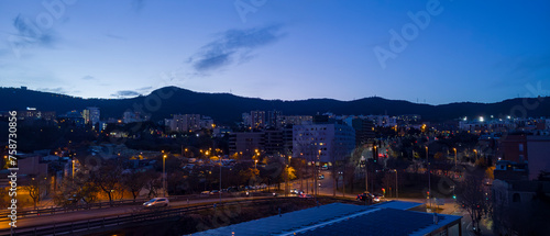 Canvas Print Night falls on the city of Barcelona, seen from the Carmel neighborhood in Horta