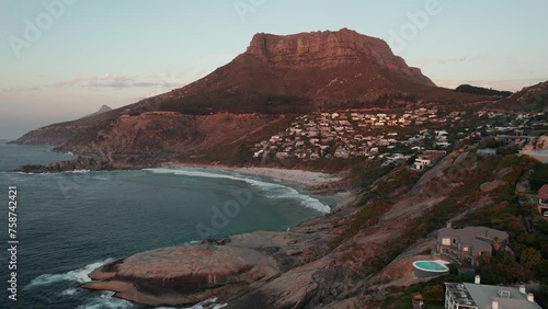 Llandudno Suburb, Beach And Mountain During Sunset In Cape Town, South Africa. - aerial shot photo