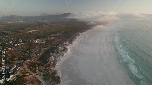 Aerial View Over Noordhoek At Sunset In Cape Town, South Africa - Drone Shot photo