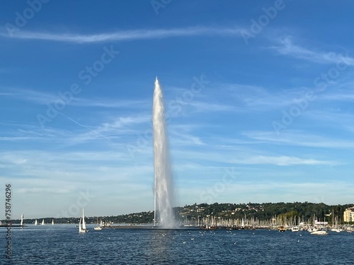 jet d'Eau fountain in Geneva with few yachts in the lake