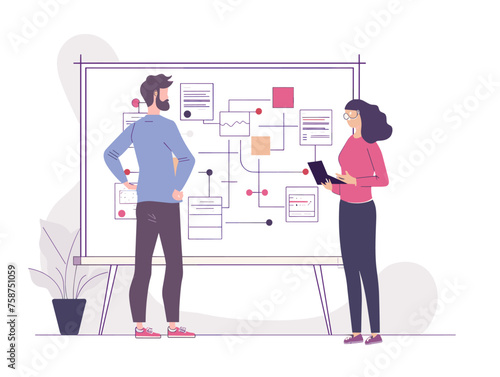  Two colleagues huddle around a whiteboard sketching out a complex flow chart to map the user experience of a new software program. 