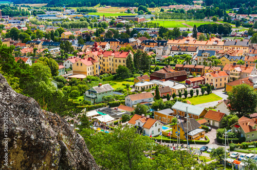 Фотография Small Town Nestled Amidst Mountains and Trees