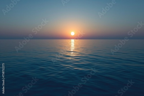 Beautiful sunset over the ocean. The orange disk of the sun sets behind the horizon in an atmosphere of peace and quiet