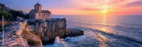An ancient stone church perched on a cliff overlooking the sea, with waves crashing below as the sun sets 