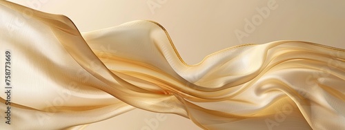 Abstract gold cloth floated on a light beige background photo