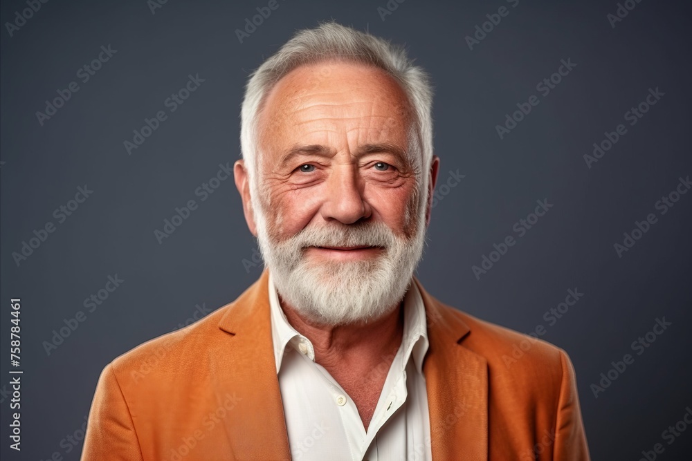 Portrait of a senior man with a grey beard. Studio shot. Portrait of a senior man with a grey beard. Studio shot.