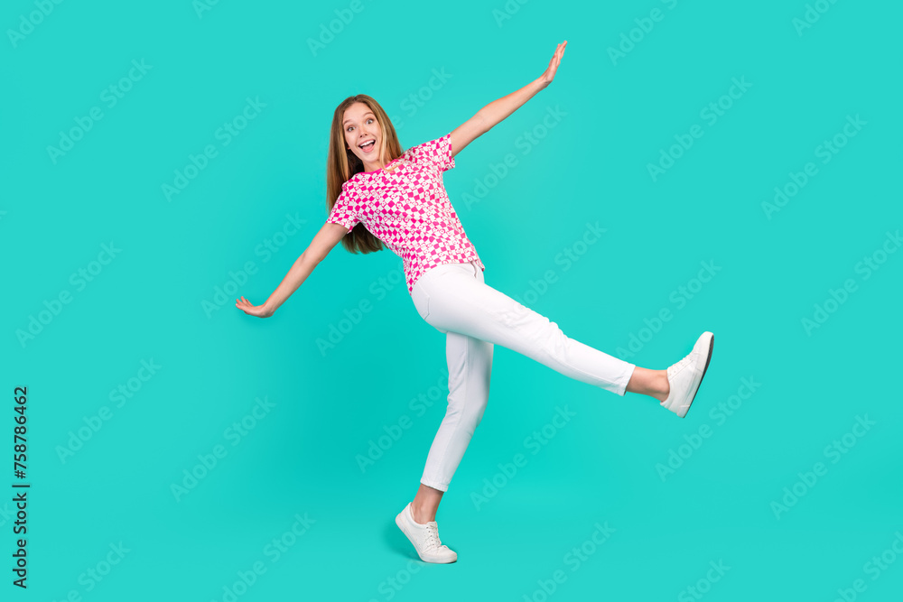 Full size photo of pretty teenager girl falling down fly walk dressed stylish pink print outfit isolated on aquamarine color background - obrazy, fototapety, plakaty 