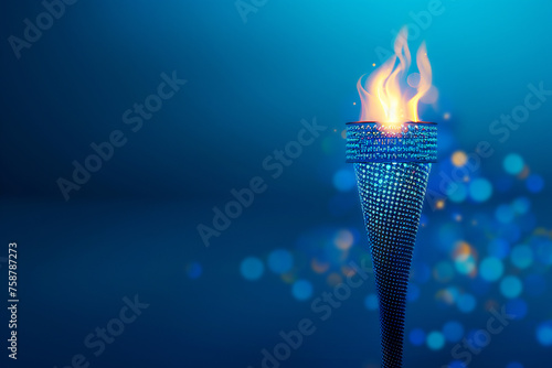 Torch with flame on blue background with blurred lights. Sport flame. Olympic torch photo