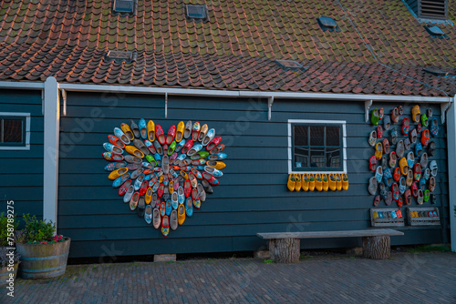 Heart shaped of multicoloured wooden shoes (In Dutch: Clogs) Zaanse Schans is a neighborhood in the Dutch town of Zaandam near Amsterdam, Noord Holland.