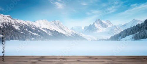 Winter-themed wooden table with space for custom display. Snowy landscape outdoors with mountains and dock in the distance.