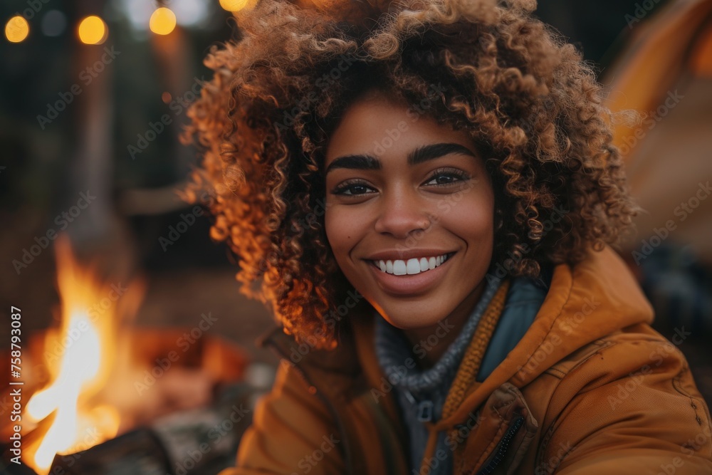 The happiness and joy with their friends around a bonfire. The happiness and joy with their friends around a bonfire.
