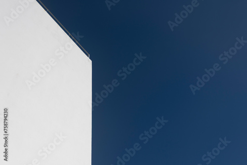 modern white wall with blue sky background