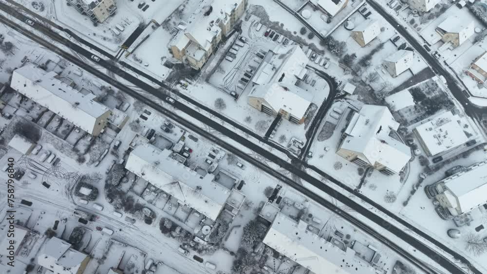 Aerial view of falling snow in the residential area Kingersheim, Mulhouse, Alsace, France. Aerial view of falling snow in the residential area Kingersheim, Mulhouse, Alsace, France.