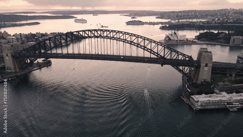 Obraz premium Aerial drone view of Sydney Harbour Bridge, NSW Australia during an early morning sunrise in March 2024 