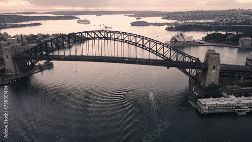 Aerial drone view of Sydney Harbour Bridge, NSW Australia during an early morning sunrise in March 2024  © Steve