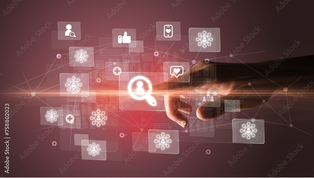 Hand pressing social media multimedia application screen with media icons on futuristic concept Hand pressing social media multimedia application screen with media icons on futuristic concept