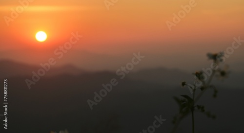 Sunset over the mountains in the evening. Description41 200 